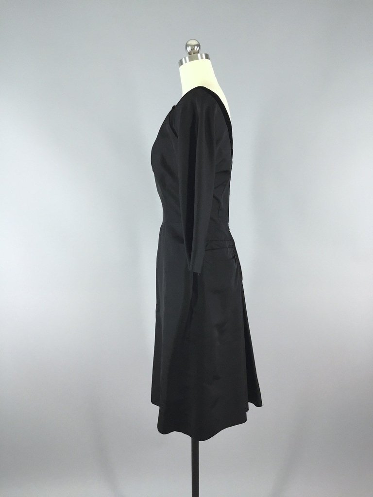 vintage 1950s black dress Retro Stage Black Bow-detail Pleated A-Line Corset Mini Dress main image 1